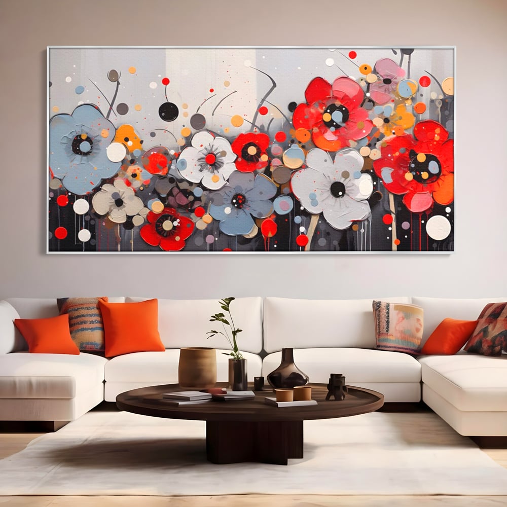 Tablou canvas cu pictura canvas cu flori colorate in relief, in rama de aluminiu argintiu, pe perete intr-un living